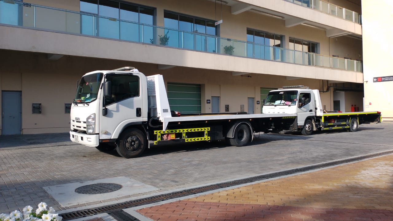 Flat Bed Car Towing fleet in Dubai